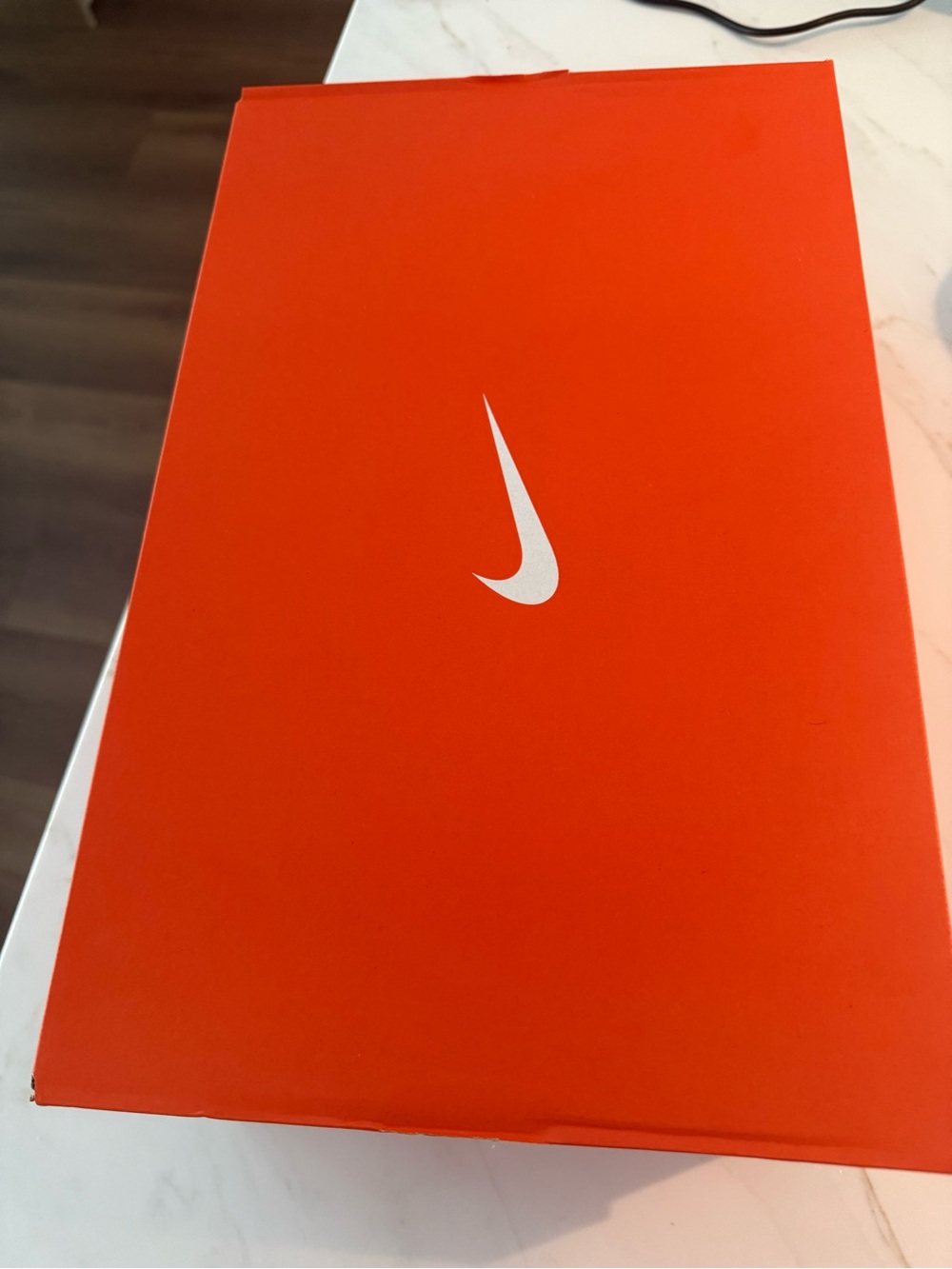 Nike Orange Box with White Swoosh Logo